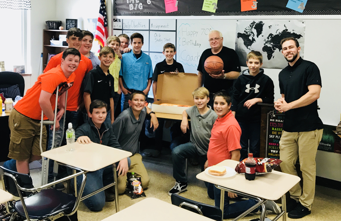 2018-2019 Puxico Jr High Boys Basketball Team with Coach Clinton & Coach Broderick after they presented Coach Clinton with the signed basketball for his 70th Birthday